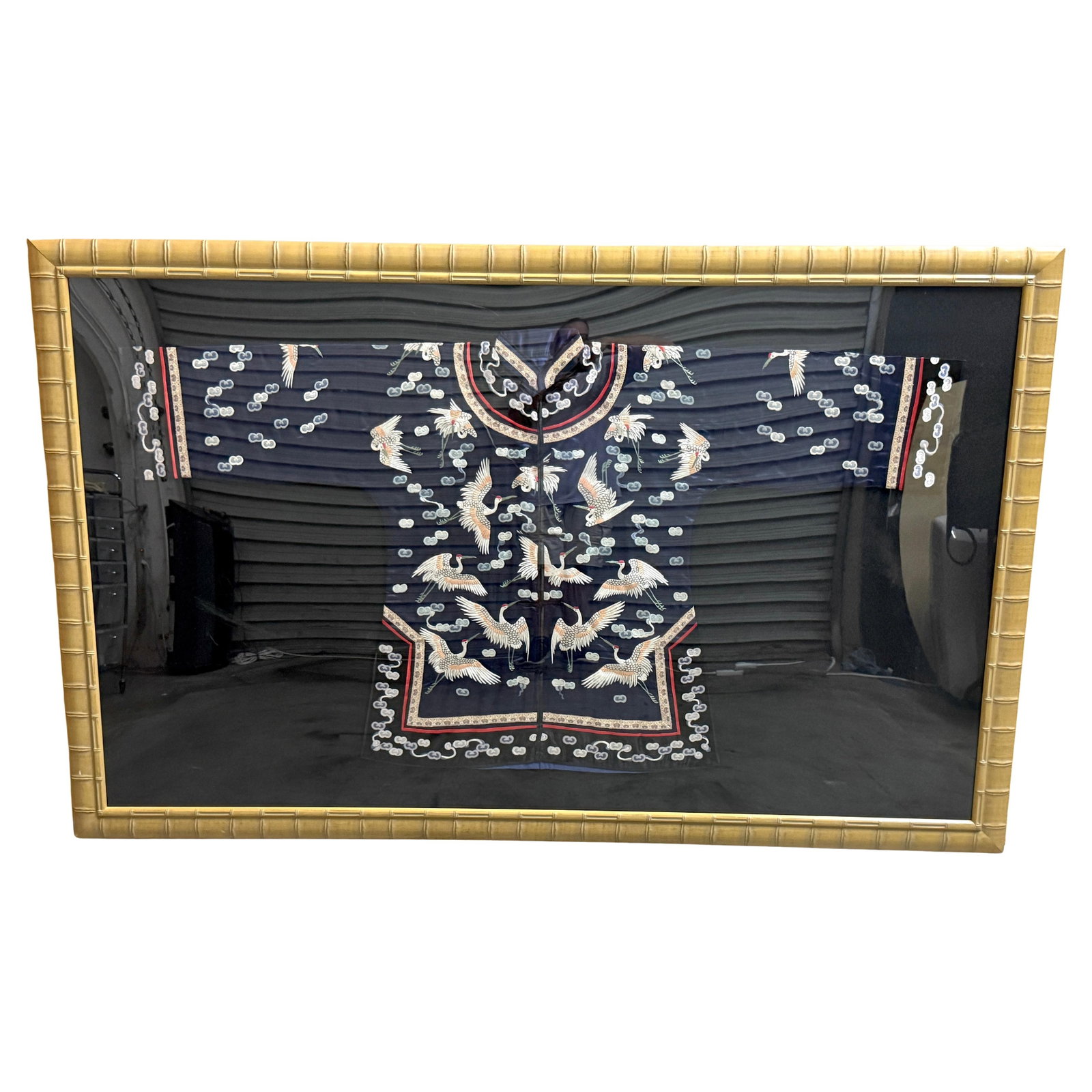 Framed 20th Century Chinese Silk Robe Flying Cranes Auspicious Clouds: Framed 20th Century Chinese Silk Robe Flying Cranes Auspicious Clouds This exquisite Framed Chinese Silk Embroidered Robe showcases a stunning display of embroidery artistry featuring flying cranes an