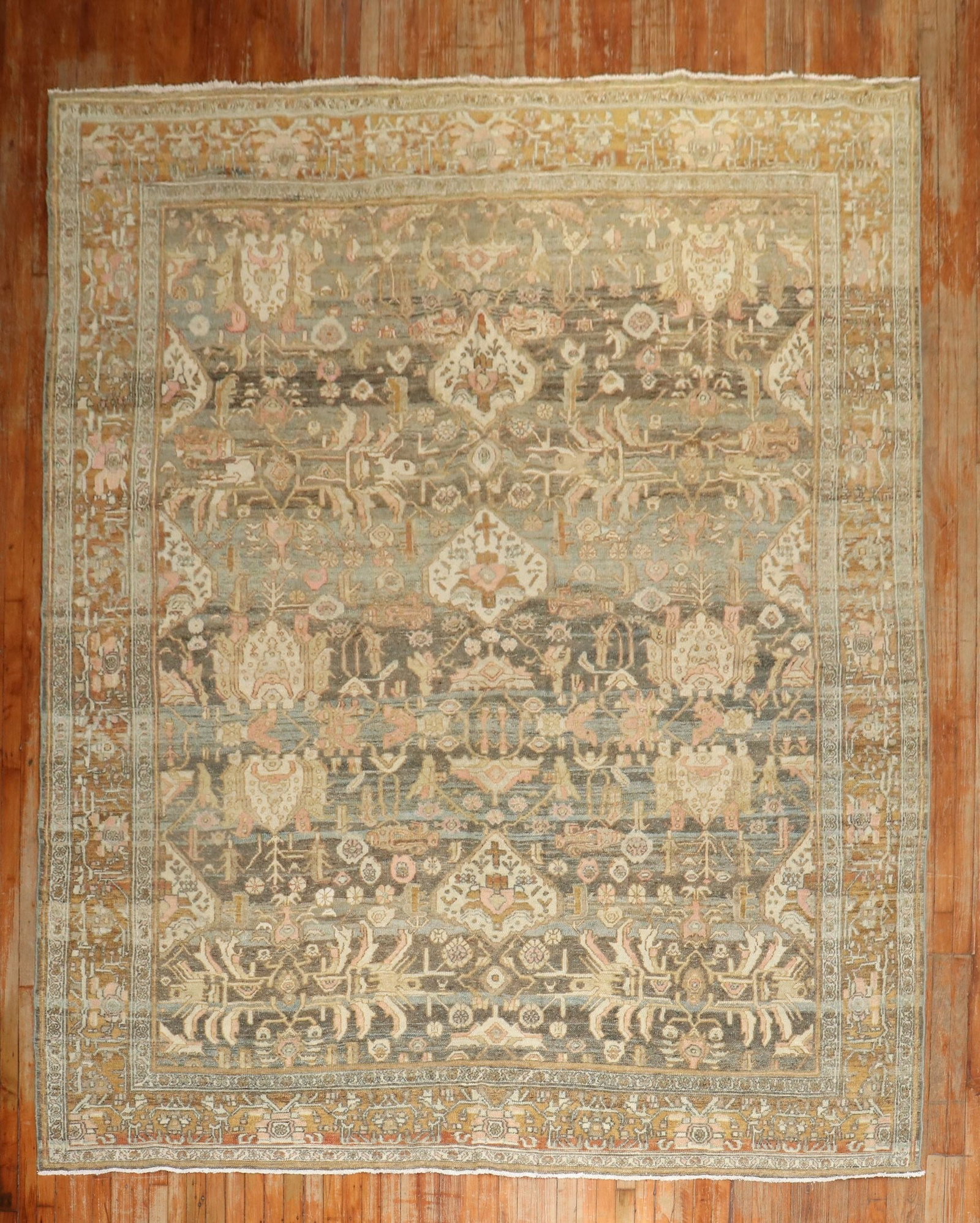 8' 8" x 11' 8" Persian Bibikabad Area Rug: 8' 8" x 11' 8" Persian Bibikabad Area Rug Early 20th century Persian Bibikabad room size rug in predominantly warm tones with soft pink accents. Pre-owned. Specifications Type: Bibikabad Category: Roo
