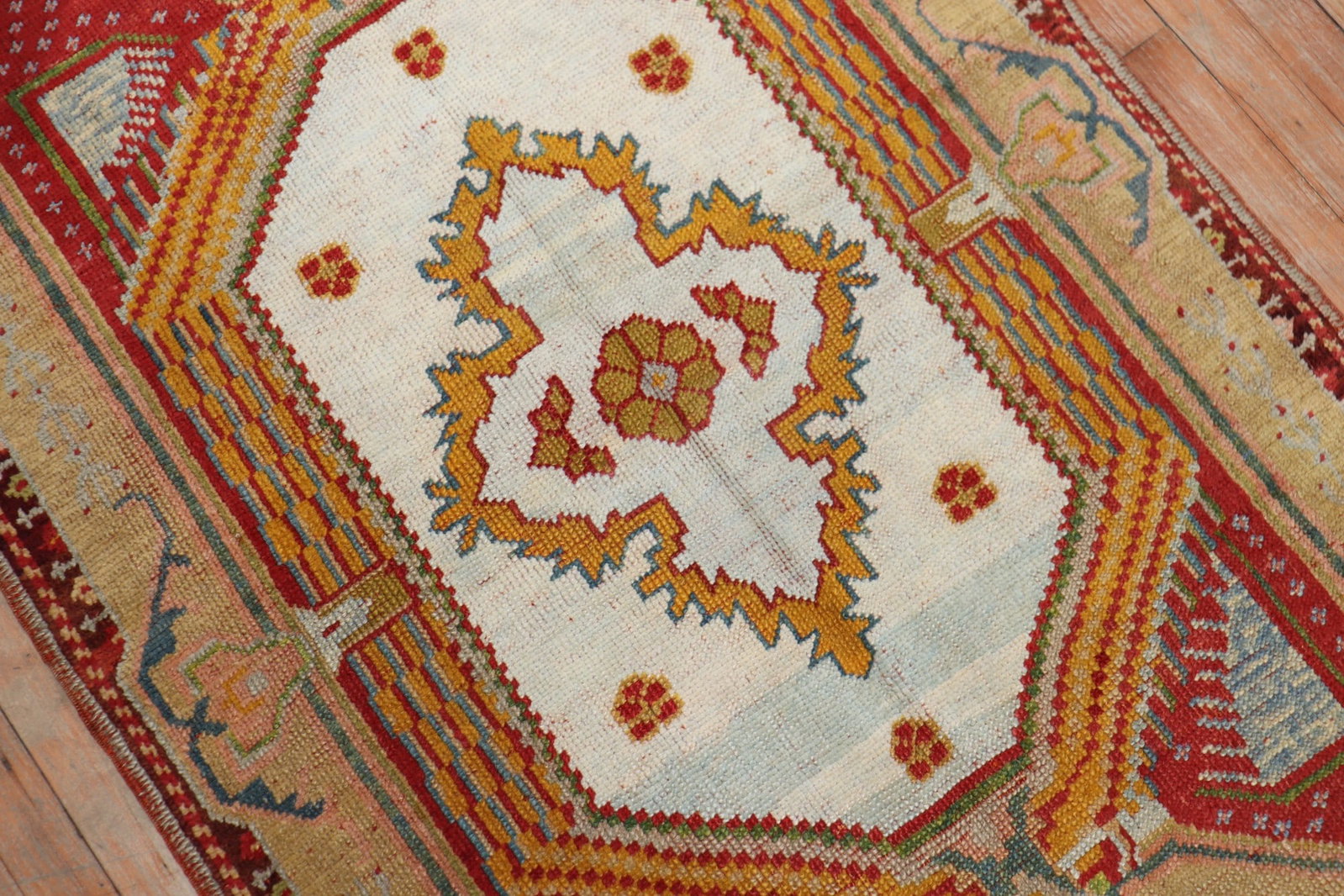 3' 8" x 5' 5" Floral Ghiordes Turkish Rug: 3' 8" x 5' 5" Floral Ghiordes Turkish Rug Early 20th century floral Ghiordes rug with a colorful Turkish design. This pre-owned small rug is identified as a Ghiordes type. Specifications Title: Colorf