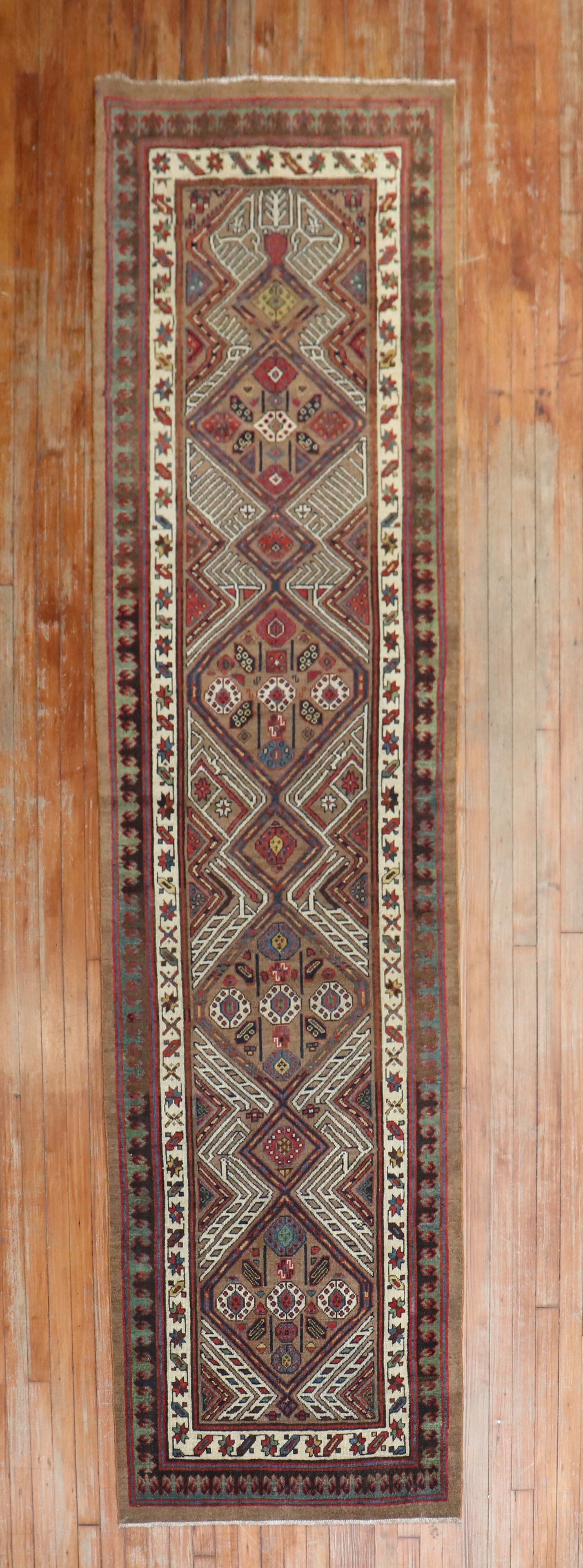 2' 11" x 10' 6" Early 20th Century Persian Serab Runner: 2' 11" x 10' 6" Early 20th Century Persian Serab Runner Early 20th century tribal Persian Serab runner with a camel field. This pre-owned rug is identified as a Serab runner. Specifications Type: Sera