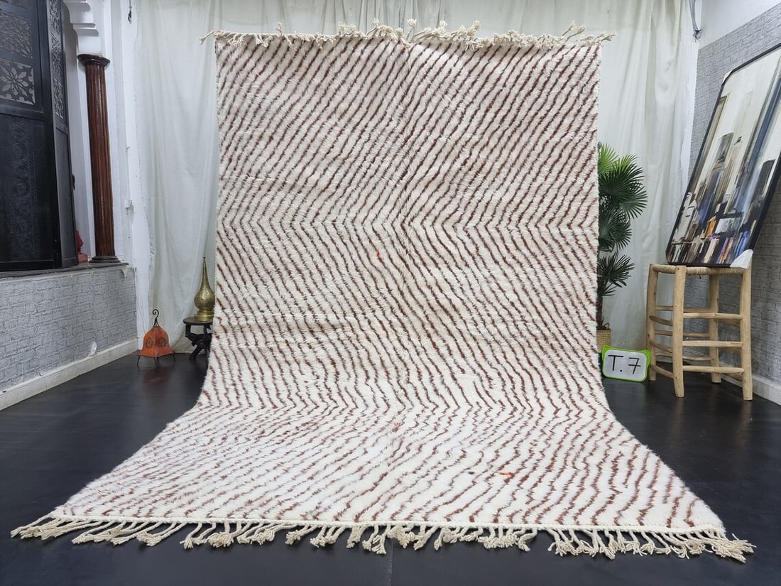 Authentic Handmade Wool Rug from Morocco 9.84 x 6.56 Feet: Authentic Handmade Wool Rug from Morocco 9.84 x 6.56 Feet Discover the beauty of this authentic Soft Handmade Wool Rug, meticulously handwoven in the Atlas Mountains by skilled local Berber women weav