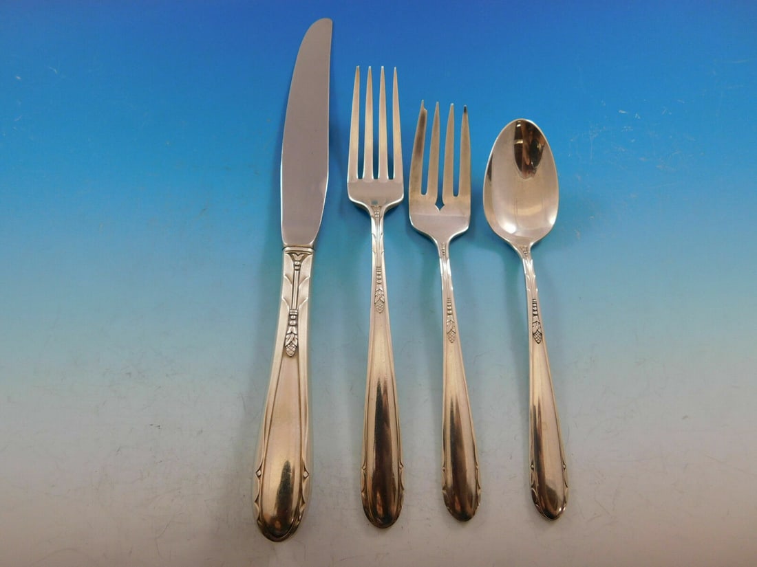 Oneida Heiress Sterling Silver 4-Piece Place Setting: Oneida Heiress Sterling Silver 4-Piece Place Setting Elevate your dining experience with this exquisite 4-piece place setting from Oneida's Heiress pattern. Crafted from high-quality sterling silver, 