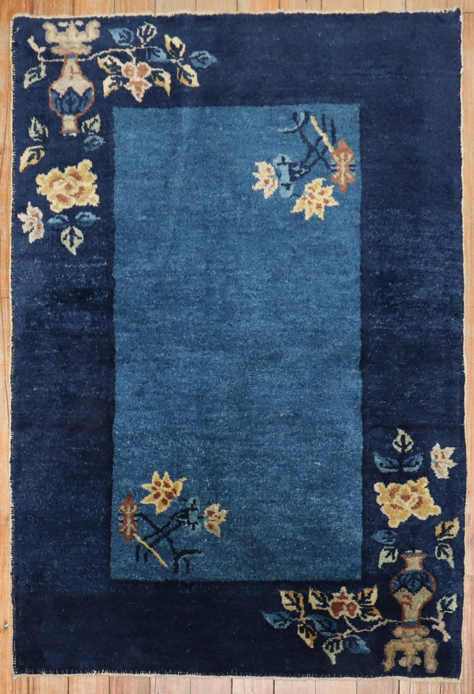 2' 1" x 2' 10" Chinese Peking navy square rug: 2' 1" x 2' 10" Chinese Peking navy square rug Pre-owned Chinese Peking small rug from the 1930s in a navy blue colorway. Classified as a square yastik, this piece offers a compact vintage format with 