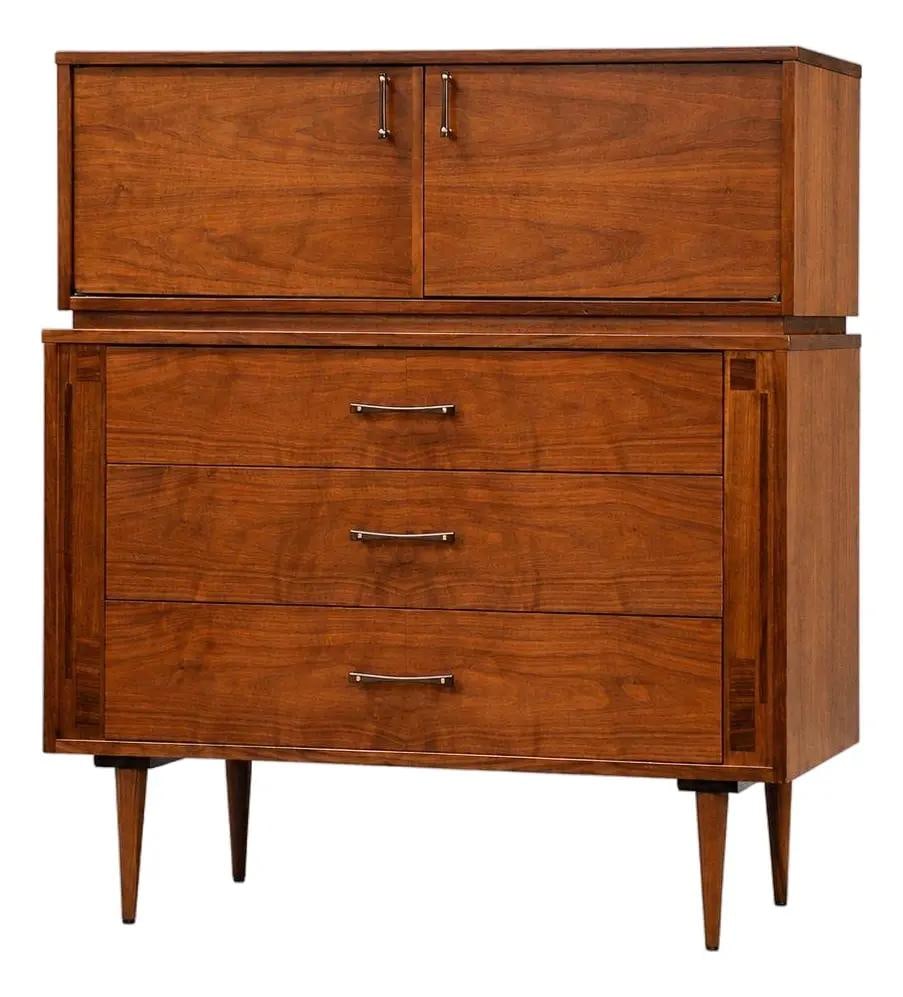 Kroehler Furniture walnut tall dresser with rosewood pulls 1960s: Kroehler Furniture walnut tall dresser with rosewood pulls 1960s Mid-century modern tall dresser made in the USA, featuring a walnut construction, dovetail drawers, two doors, and rosewood drawer pull