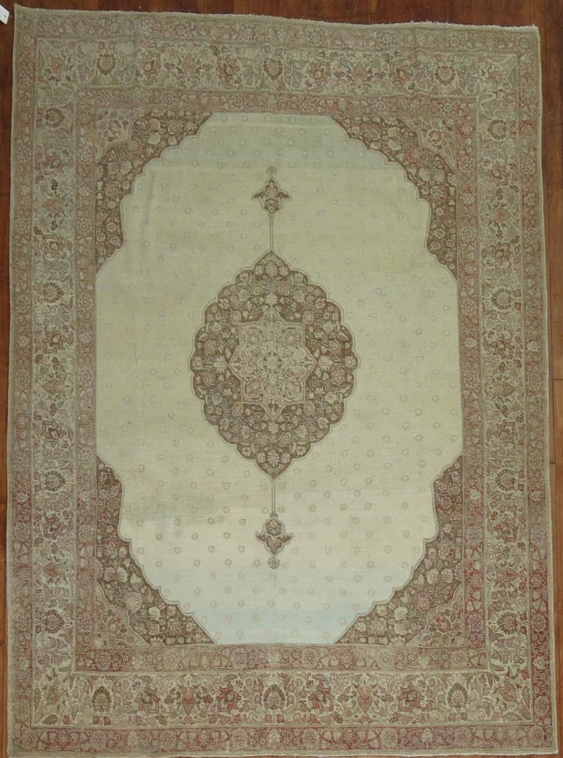 6' 8" x 9' Persian Tabriz Rug with Light Blue Field: 6' 8" x 9' Persian Tabriz Rug with Light Blue Field Late 19th century Persian Tabriz rug with a light blue field. This pre-owned rug is identified as an intermediate category Tabriz piece. Specificati