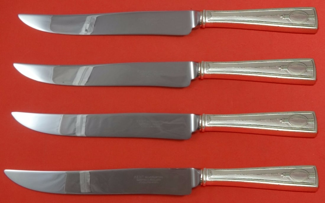 Carthage by Wallace Sterling Silver Texas Sized Steak Knife Set 4pc: Carthage by Wallace Sterling Silver Texas Sized Steak Knife Set 4pc Enhance your dining experience with the Carthage by Wallace Sterling Silver Steak Knife Set. This exceptional 4-piece set features l