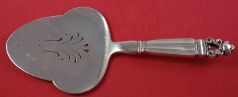 Georg Jensen Acorn Sterling Silver Tart Server 9 1/8 inches GI Mark: Georg Jensen Acorn Sterling Silver Tart Server 9 1/8 inches GI Mark This exquisite tart server from the Acorn pattern by Georg Jensen showcases a stunning design crafted from sterling silver. The serv