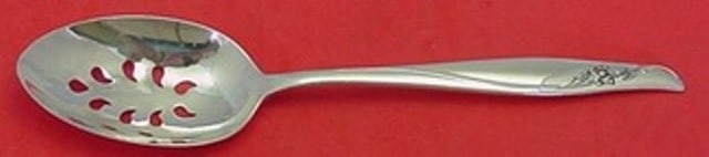Gorham Sea Rose Sterling Silver Pierced Serving Spoon 8.5 Inch: Gorham Sea Rose Sterling Silver Pierced Serving Spoon 8.5 Inch This exquisite Sea Rose serving spoon from Gorham is crafted from high-quality sterling silver. Featuring a beautifully designed pierced 