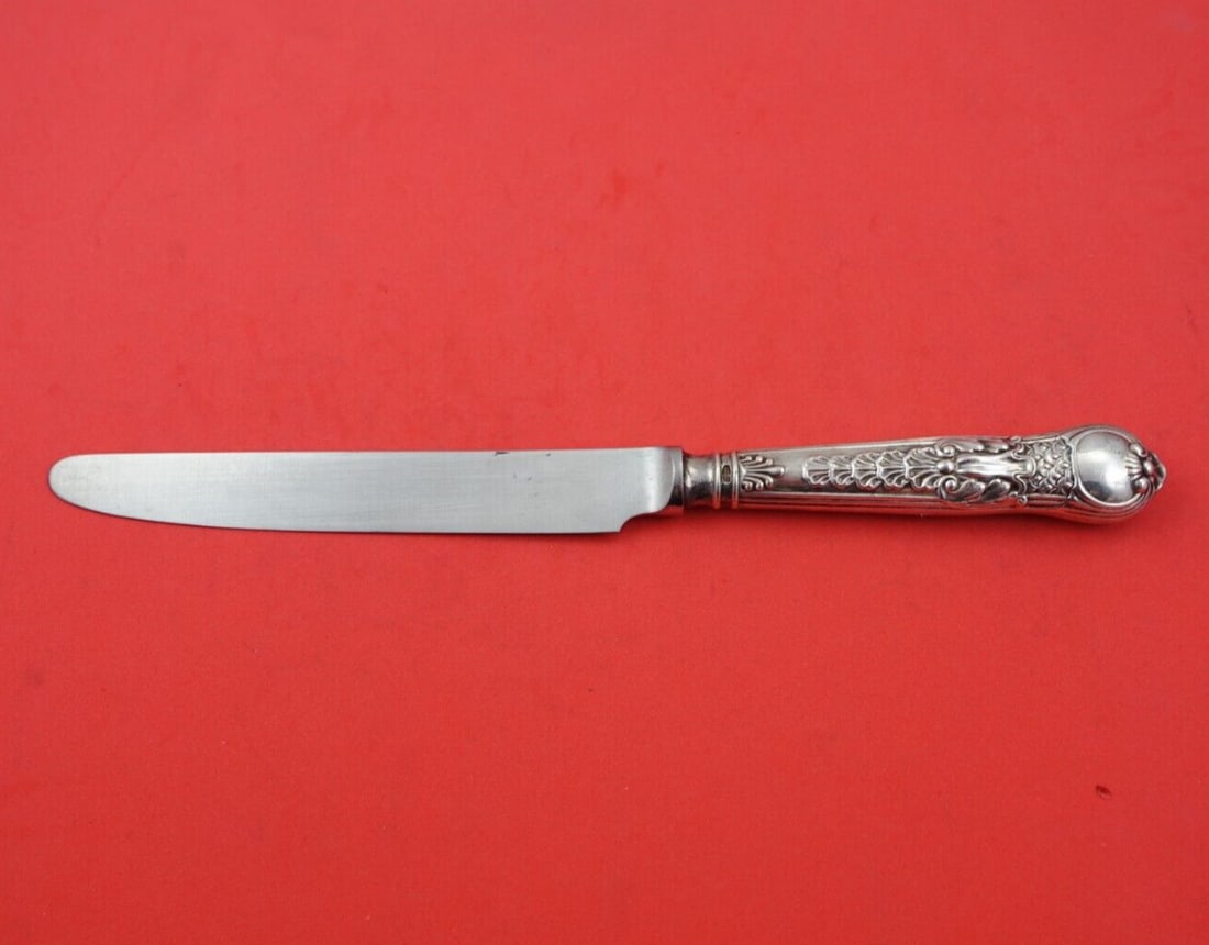 CJ Vander Coburg Sterling Silver Dinner Knife 9 7/8 Inches: CJ Vander Coburg Sterling Silver Dinner Knife 9 7/8 Inches This exquisite dinner knife, part of the Coburg pattern by CJ Vander, showcases a sterling silver hollow handle complemented by a durable sta