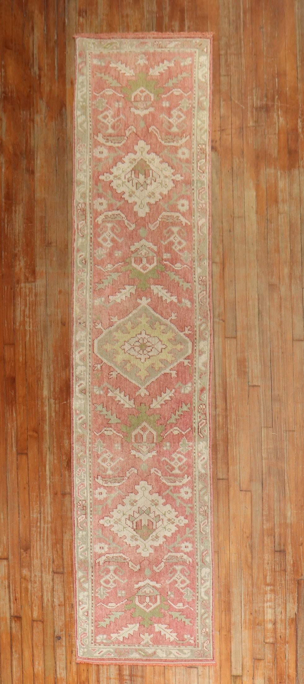 2' 5" x 12' 6" Turkish Oushak rug runner early 20th century: 2' 5" x 12' 6" Turkish Oushak rug runner early 20th century Early 20th century Turkish Oushak runner rug with a narrow profile. This pre-owned piece is identified as an Oushak runner and offers the ch