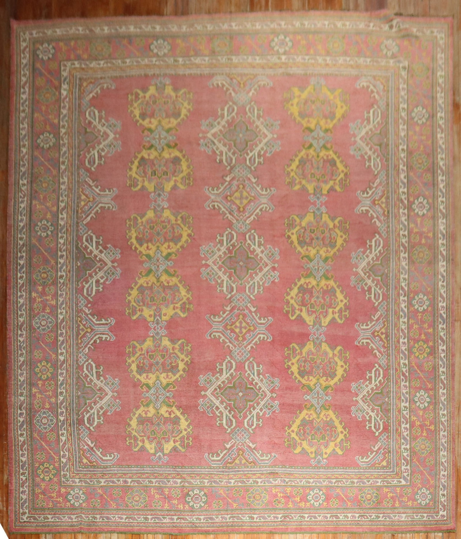 11' 7" x 15' Turkish Oushak Rug Crab Pattern: 11' 7" x 15' Turkish Oushak Rug Crab Pattern Early 20th century Turkish Oushak rug featuring an all-over crab design on a pinky red ground. This pre-owned oversize rug presents a classic decorative pa