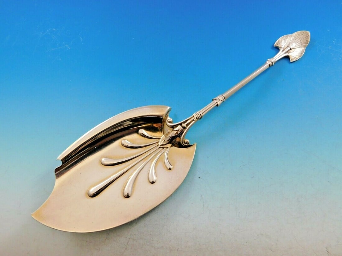 Gorham Lotus Sterling Silver Ice Cream Server 10 1/4" Floral Design: Gorham Lotus Sterling Silver Ice Cream Server 10 1/4" Floral Design Indulge in a touch of elegance with this stunning ice cream server from the Lotus pattern by Gorham. Crafted from high-quality sterl