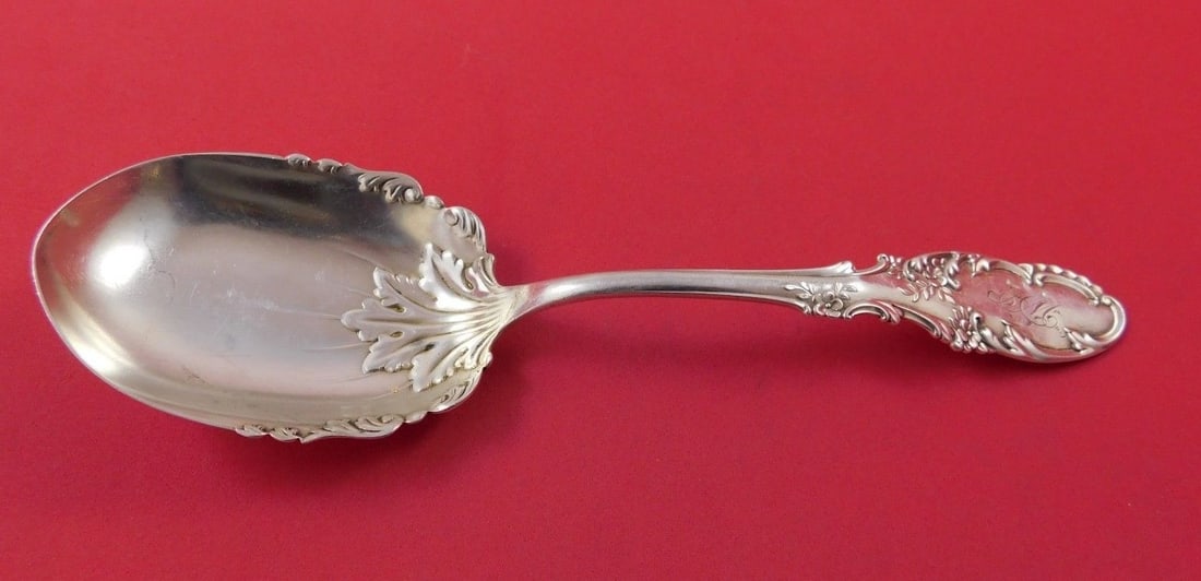 Frank Whiting Orleans Sterling Silver Preserve Spoon 7 1/2: Frank Whiting Orleans Sterling Silver Preserve Spoon 7 1/2 This is an Orleans preserve spoon by Frank Whiting, made of sterling silver and featuring a design in the bowl. It is monogrammed, with monos