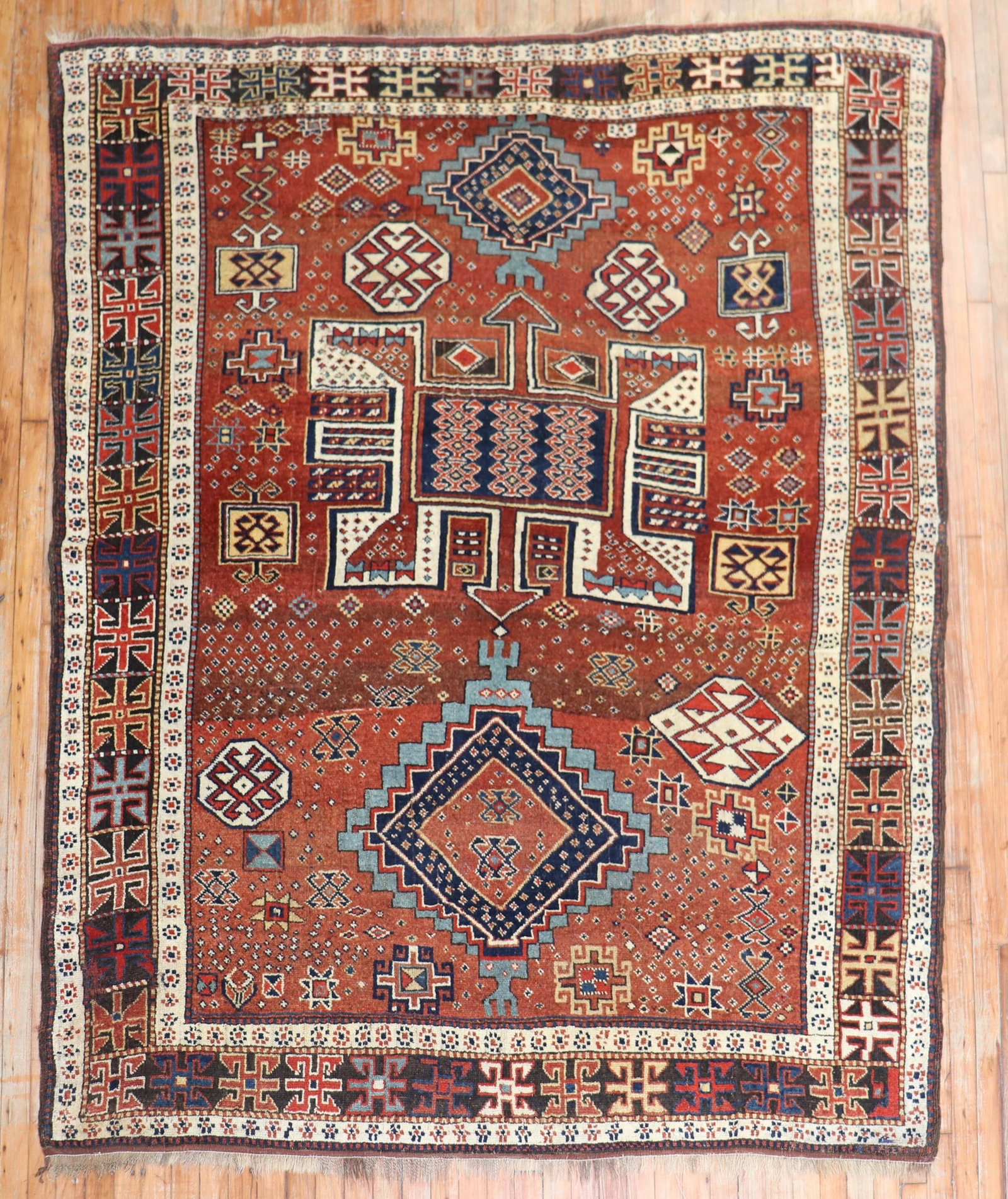 6' 7" x 8' Early 20th Century Kurd Square Rug: 6' 7" x 8' Early 20th Century Kurd Square Rug Early 20th century Kurdish tribal square rug with intricate geometric patterning. This pre-owned piece reflects traditional tribal design and is categoriz
