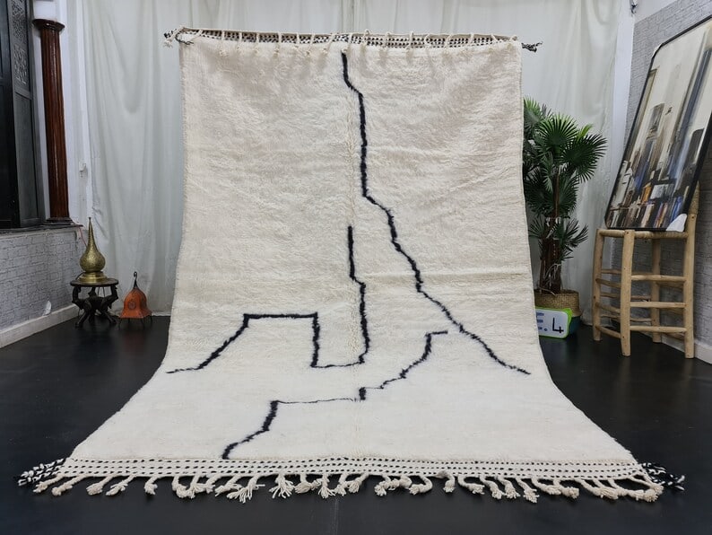 Handwoven Soft White Rug 100% Sheep Wool Moroccan Craftsmanship 8 x 5 Feet: Handwoven Soft White Rug 100% Sheep Wool Moroccan Craftsmanship 8 x 5 Feet Experience the luxurious texture of this fabulous soft white rug, handwoven in the Atlas Mountains by skilled local Berber wo