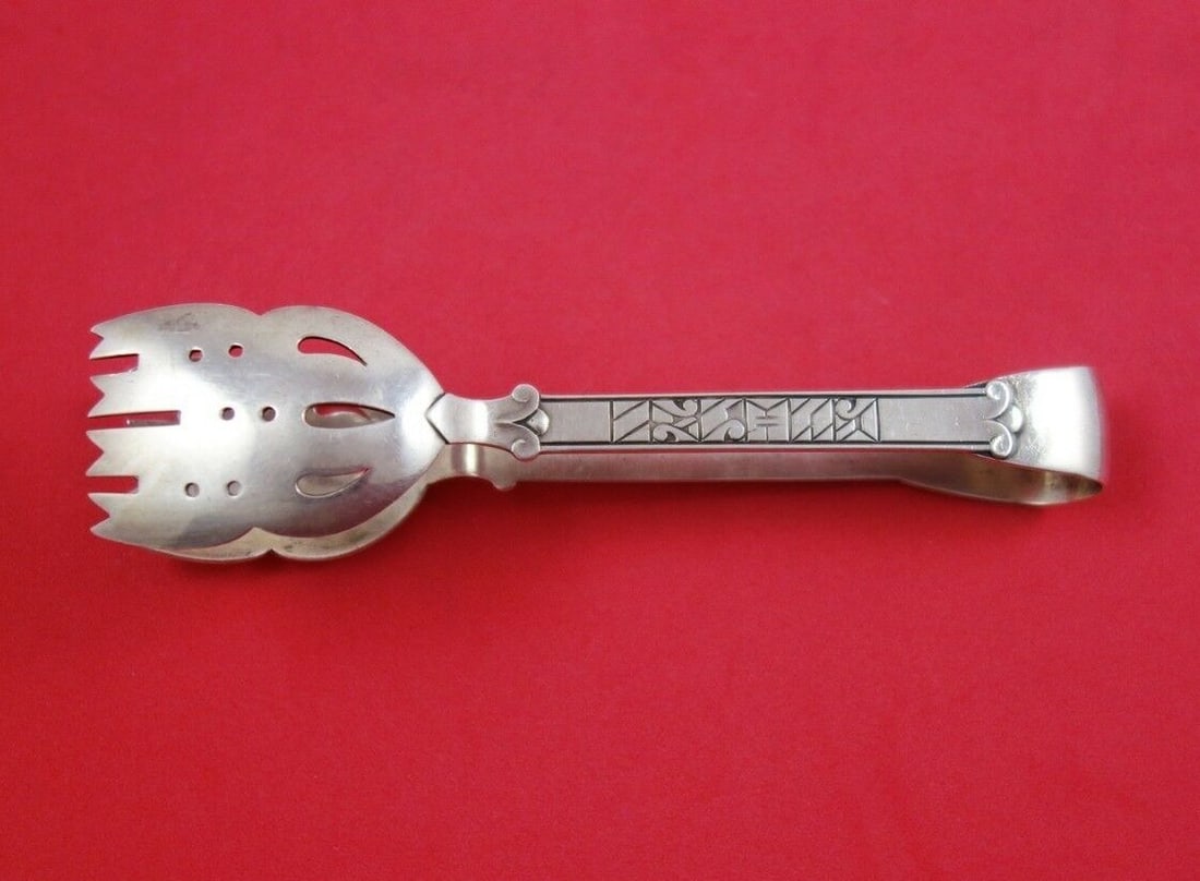Vintage Danish Sterling Silver Pierced Ice Tong 5 3/4 inch Circa 1920: Vintage Danish Sterling Silver Pierced Ice Tong 5 3/4 inch Circa 1920 This vintage Danish sterling silver ice tong, measuring 5 3/4 inches, features a pierced design and dates back to circa 1920. Craf