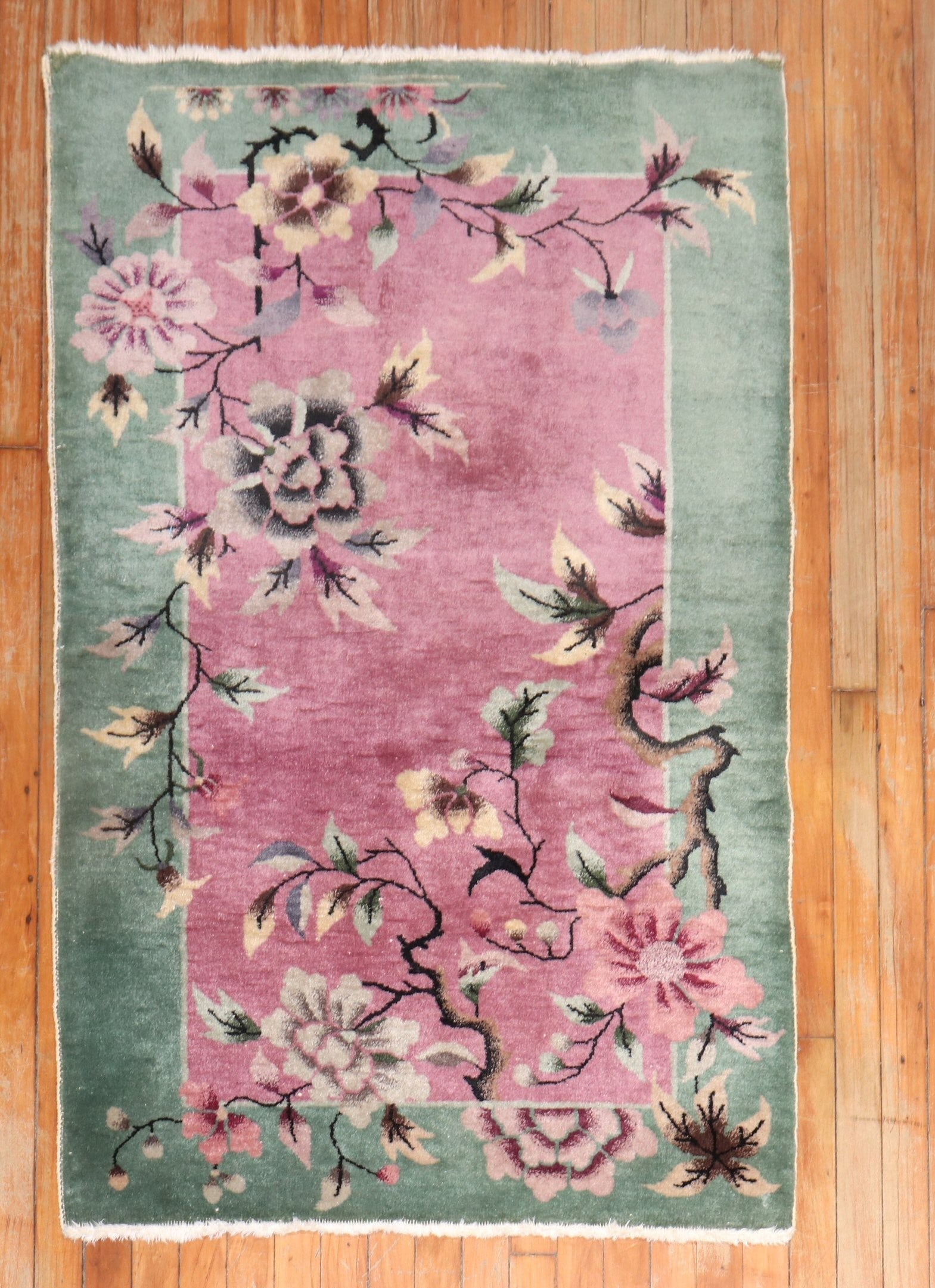 3' x 4' 9" Chinese Deco Scatter Rug in Pink and Green: 3' x 4' 9" Chinese Deco Scatter Rug in Pink and Green 1940s Chinese Art Deco scatter size rug in pink and green. This pre-owned piece features a compact small-format size suitable for a variety of int
