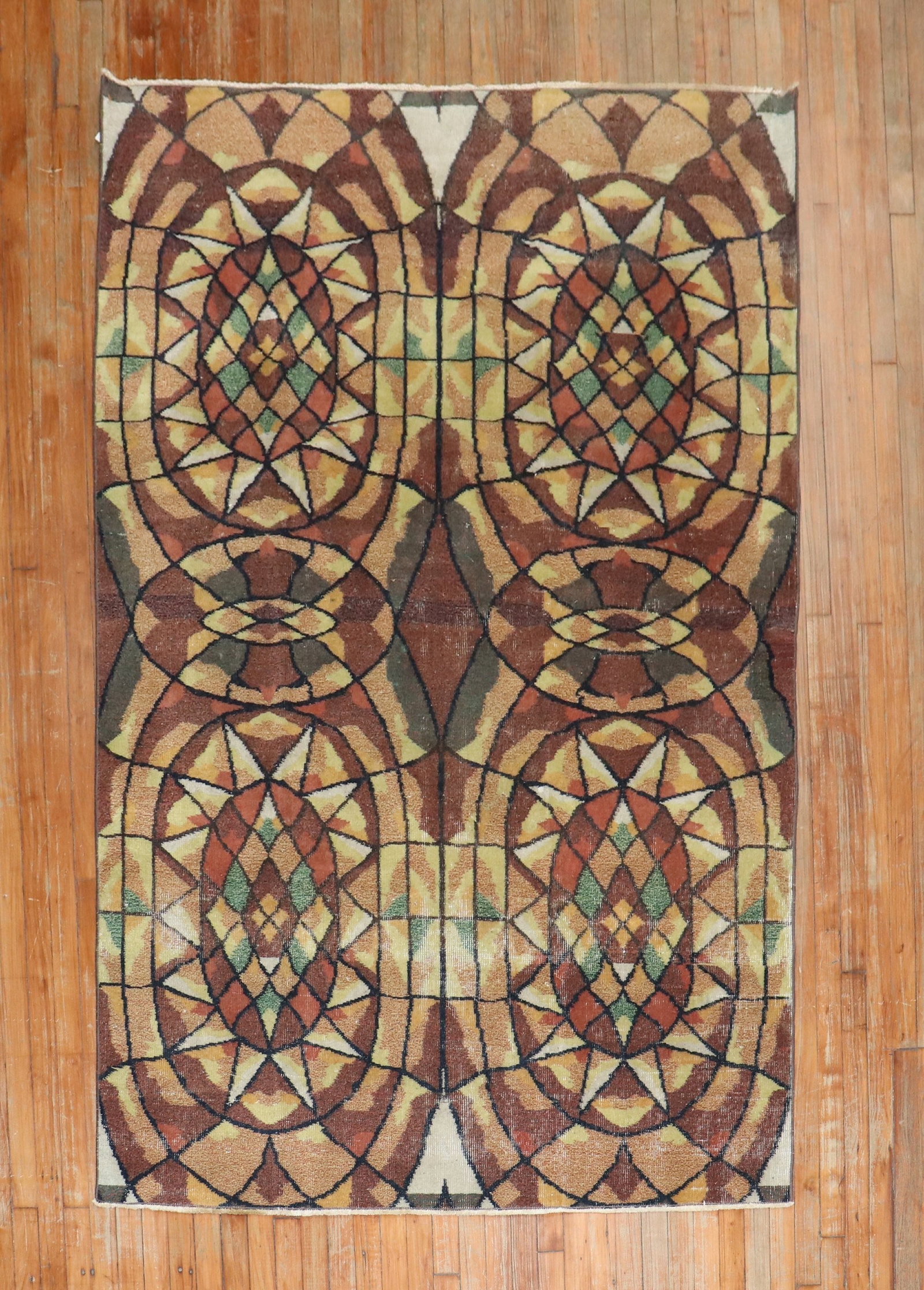 5' x 8' 6" Turkish Deco Rug by Zeki Muren: 5' x 8' 6" Turkish Deco Rug by Zeki Muren Mid 20th century Turkish Deco rug by Zeki Muren. This pre-owned rug features a Deco design and is presented as an intermediate category piece. Specifications 