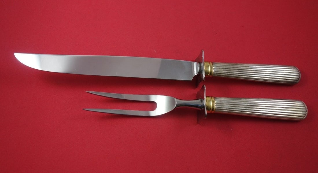 2 Piece Sterling Silver Carving Set Reed Barton Ashmont Gold: 2 Piece Sterling Silver Carving Set Reed Barton Ashmont Gold A 2-piece steak carving set in the Ashmont Gold pattern by Reed & Barton. The set features sterling silver hollow handles with stainless st