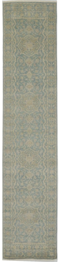 Hand-knotted wool floral runner 2'7 x 14'2 transitional rug: Hand-knotted wool floral runner 2'7 x 14'2 transitional rug This handmade runner rug features a transitional floral pattern in muted tones of teal, cream, beige, and more. Crafted in India using hand-