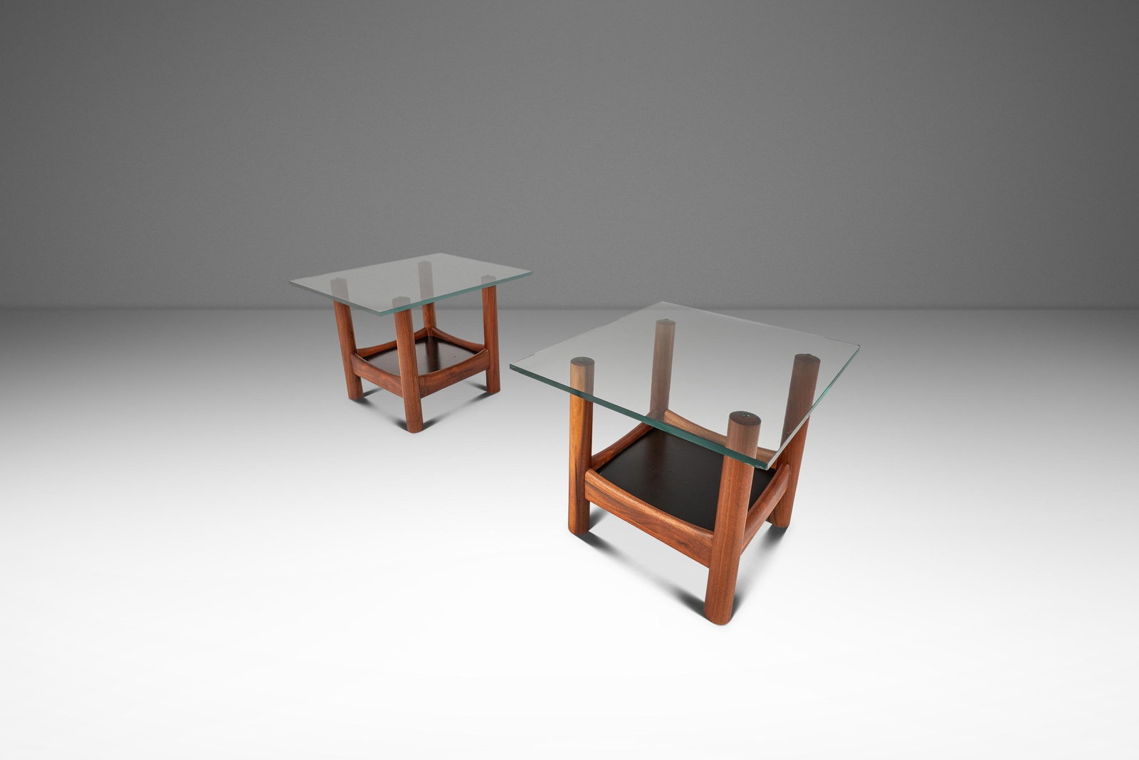 Pair of Walnut and Glass End Tables in the Manner of Adrian Pearsall: Pair of Walnut and Glass End Tables in the Manner of Adrian Pearsall Set of two custom-made end tables made in the manner of Adrian Pearsall for Craft Associates, dating to the 1960s. Each table