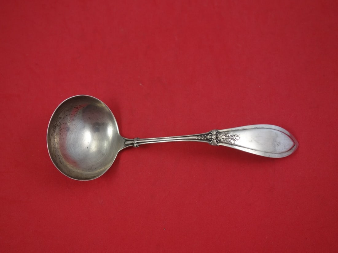 Whiting Italian Pattern Sterling Silver Gravy Ladle 7 1/8": Whiting Italian Pattern Sterling Silver Gravy Ladle 7 1/8" This exquisite gravy ladle, crafted by Whiting Manufacturing Company, showcases the elegant Italian pattern and is made of high-quality sterl