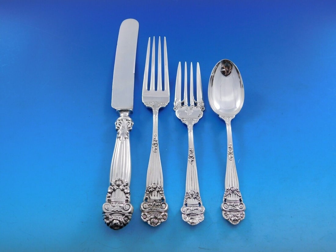 Towle Georgian sterling silver 4 piece regular place setting: Towle Georgian sterling silver 4 piece regular place setting Georgian by Towle is a 4-piece regular size sterling silver place setting in the Georgian pattern. It includes a regular knife with a plate