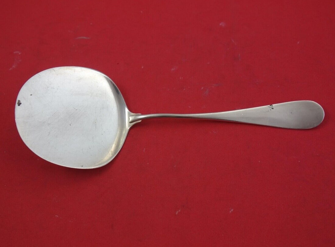 Michelsen Classic Sterling Silver Tomato Server 7 3/4 Inches: Michelsen Classic Sterling Silver Tomato Server 7 3/4 Inches Add a touch of elegance to your dining experience with this Classic by Michelsen Sterling Silver Tomato Server. Measuring 7 3/4 inches, thi