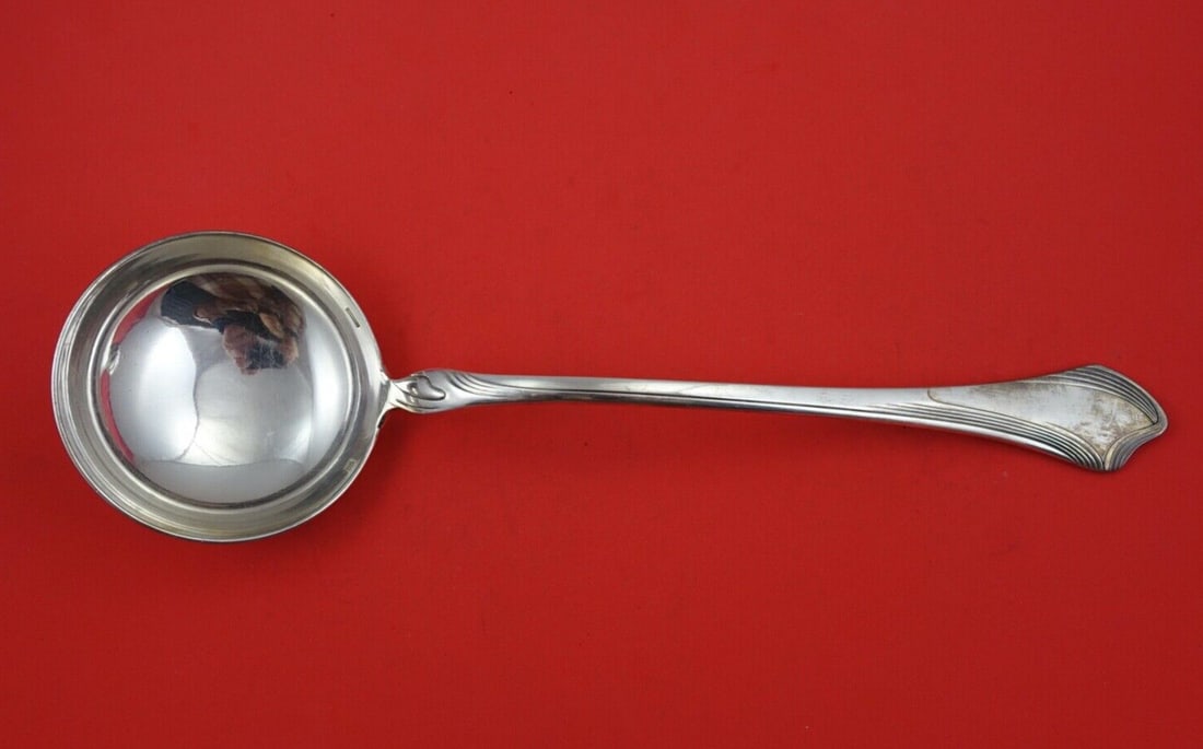 Christofle Moderne Gramont Silverplate Soup Ladle 13 Inch Monogrammed: Christofle Moderne Gramont Silverplate Soup Ladle 13 Inch Monogrammed Elevate your dining experience with this exquisite soup ladle from the Moderne Gramont pattern by Christofle. Crafted in silverpla