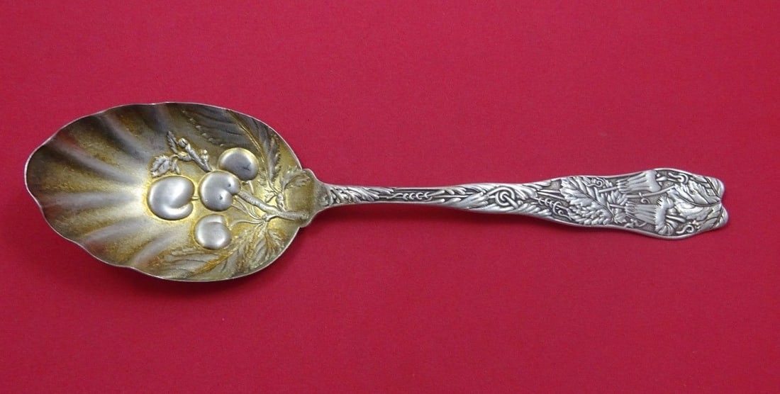 Wallace Saint Leon Sterling Silver Berry Spoon with Cherries 8 3/4 inches: Wallace Saint Leon Sterling Silver Berry Spoon with Cherries 8 3/4 inches This exquisite serving spoon features the Saint Leon pattern by Wallace, crafted from high-quality sterling silver. The spoon 