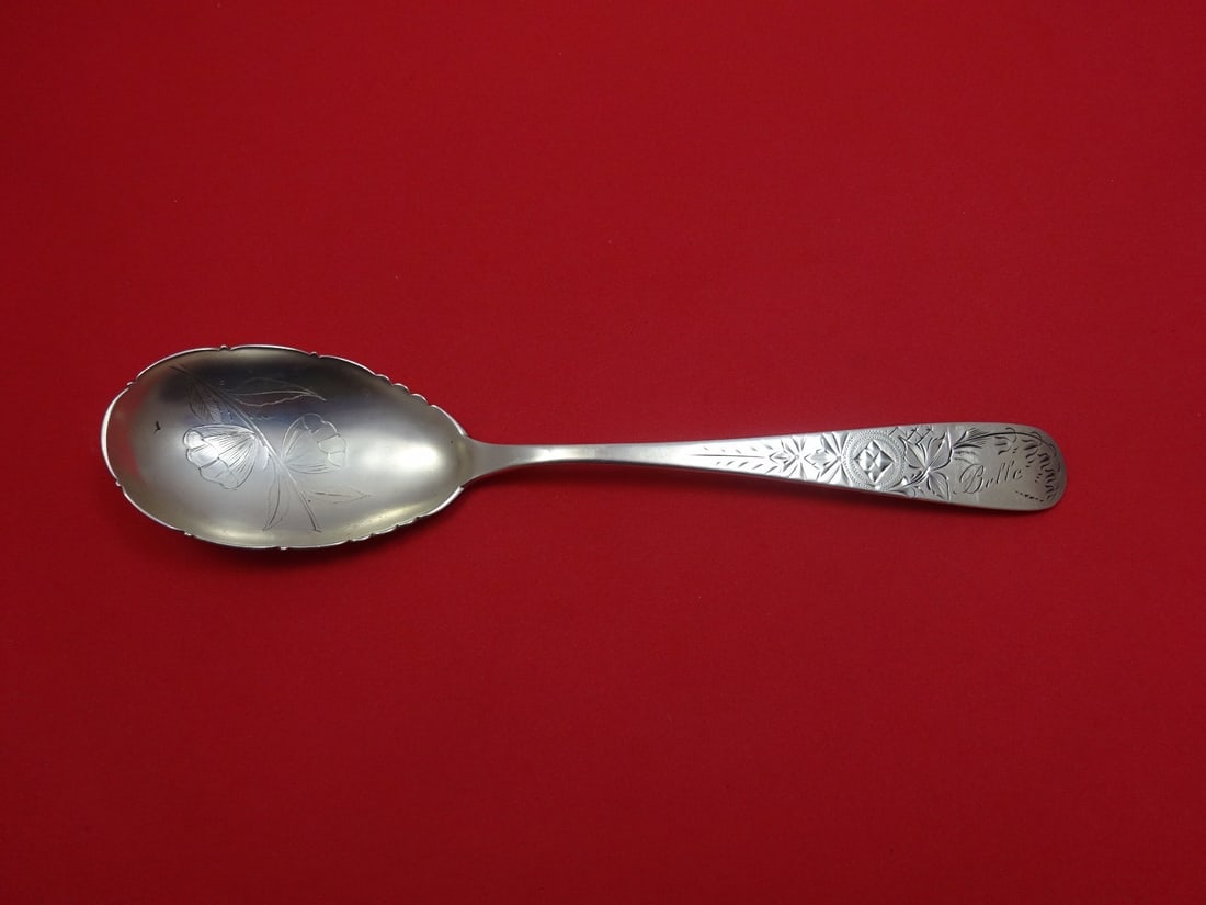 Hennegan & Bates Antique Lily Sterling Silver Preserve Spoon with Poppies: Hennegan & Bates Antique Lily Sterling Silver Preserve Spoon with Poppies This exquisite Antique Lily Engraved Preserve Spoon, crafted by Hennegan & Bates, features a beautifully detailed poppy design