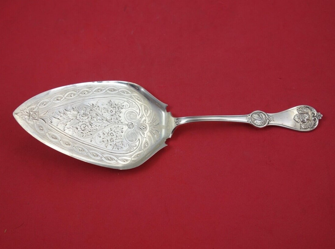Durgin Strawberry Coin Silver Pie Server 9 1/4 inches Brite-Cut Flowers: Durgin Strawberry Coin Silver Pie Server 9 1/4 inches Brite-Cut Flowers This exquisite pie server, crafted by Durgin, showcases the elegant Strawberry pattern. Made from coin silver, it features beaut