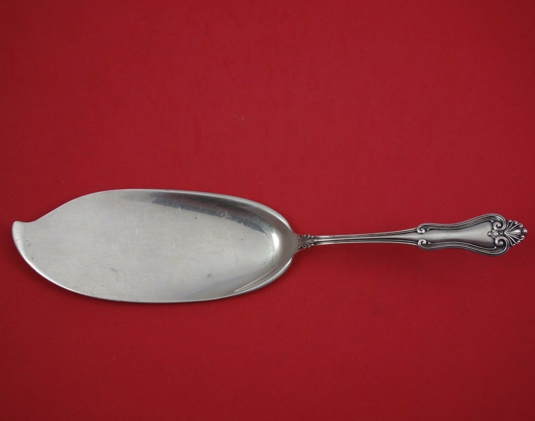 Alvin Sterling Silver Fish Server Suffolk Pattern 10.5": Alvin Sterling Silver Fish Server Suffolk Pattern 10.5" This exquisite fish server features a classic Suffolk pattern by Alvin, crafted from high-quality sterling silver. Measuring 10 1/2" in length, 