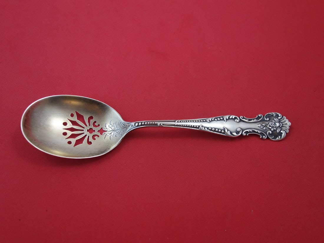 Fessenden Old Rose Sterling Silver Ice Spoon Goldwashed 7.25 in: Fessenden Old Rose Sterling Silver Ice Spoon Goldwashed 7.25 in This exquisite serving spoon, part of the Old Rose pattern by Fessenden, is crafted from sterling silver with a beautiful goldwash finis