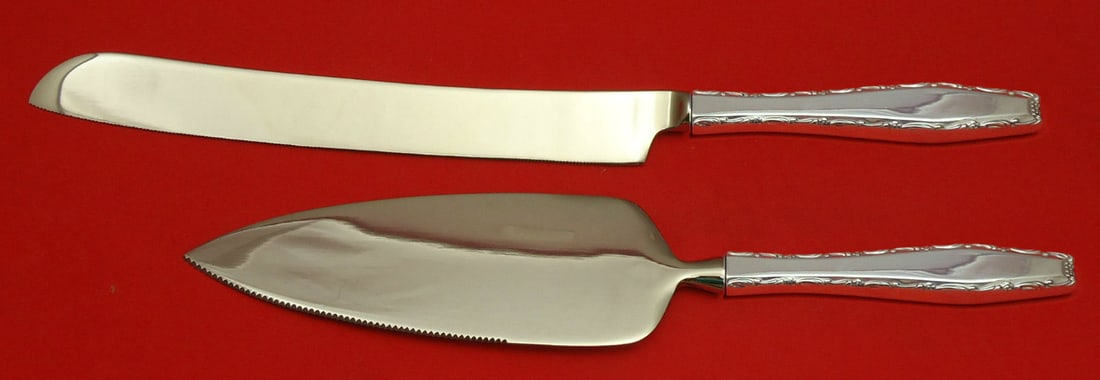 2pc wedding cake knife and server set Lunt Rapallo sterling silver: 2pc wedding cake knife and server set Lunt Rapallo sterling silver Custom made 2-piece Rapallo by Lunt wedding cake set in sterling silver with hollow handles and stainless steel serving ends. This pr