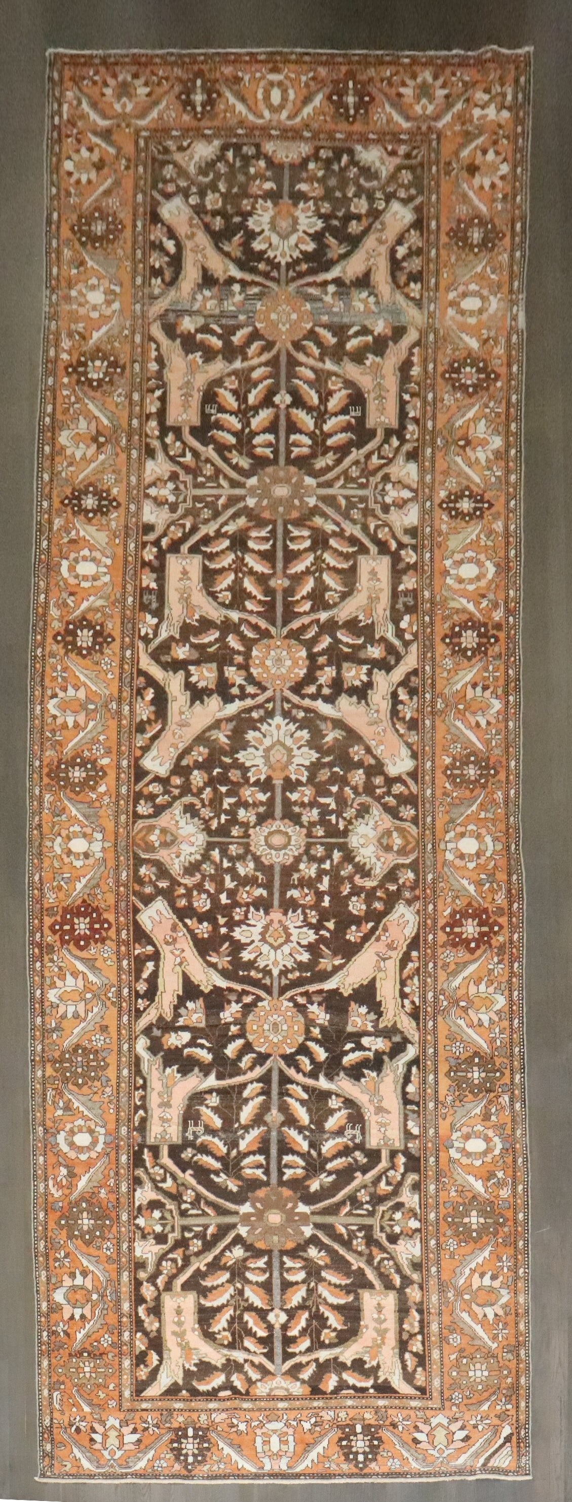 5' 2" x 15' 6" Persian Bakhtiari Brown Corridor Rug: 5' 2" x 15' 6" Persian Bakhtiari Brown Corridor Rug An early 20th-century Persian Bakhtiari corridor rug in a brown colorway. This pre-owned gallery-size piece offers the long, narrow proportions typi