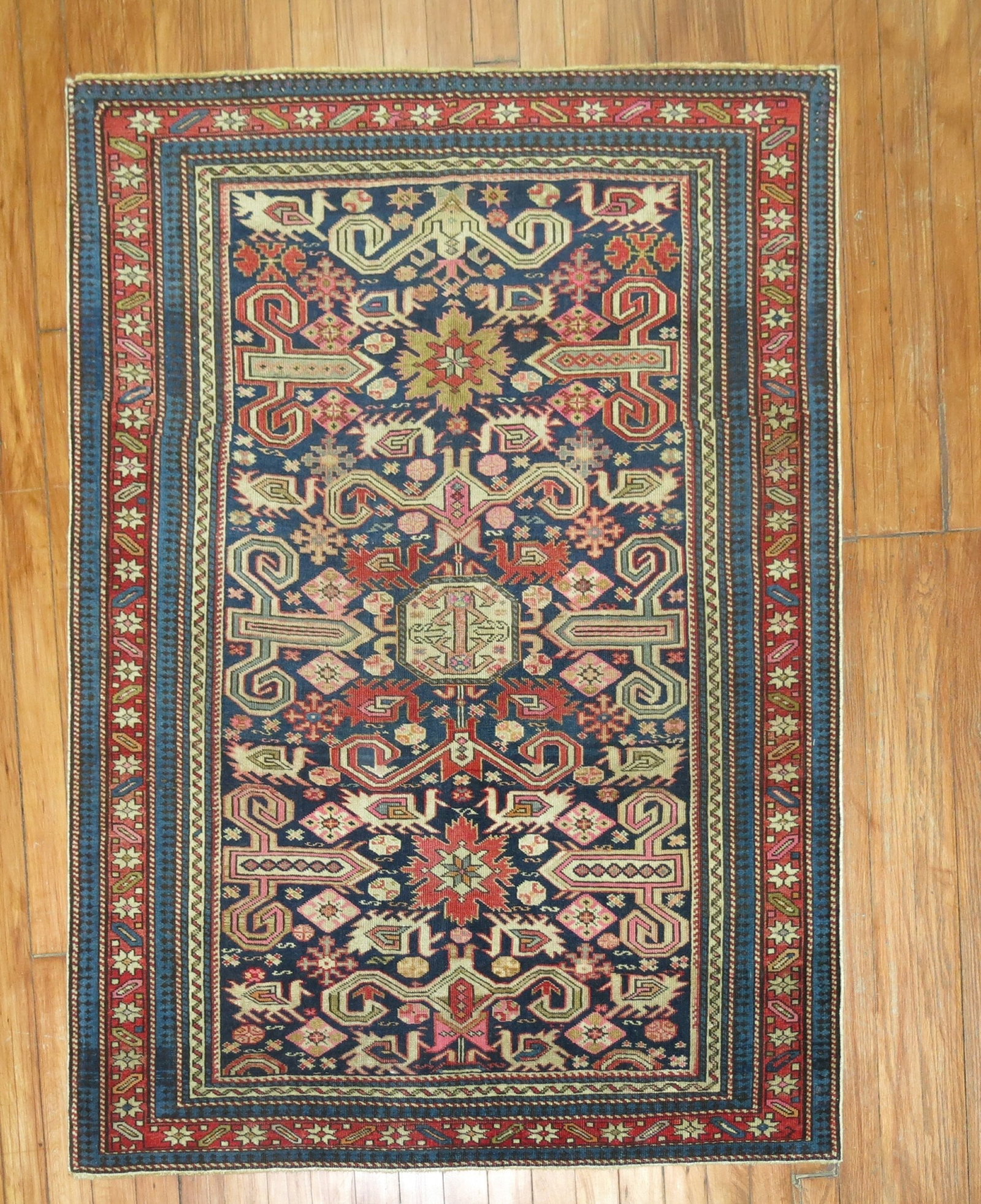 3' 3" x 4' 3" Caucasian Shirvan Square Rug: 3' 3" x 4' 3" Caucasian Shirvan Square Rug Early 20th century Caucasian Shirvan rug in a small square format. This pre-owned piece offers the character and craftsmanship associated with antique region
