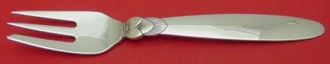 Georg Jensen Cactus Sterling Silver Pastry Fork 5 1/8" GI/GJ Mark: Georg Jensen Cactus Sterling Silver Pastry Fork 5 1/8" GI/GJ Mark This exquisite pastry fork from the renowned Georg Jensen showcases the iconic Cactus pattern, designed by sculptor Gundolph Albertus 