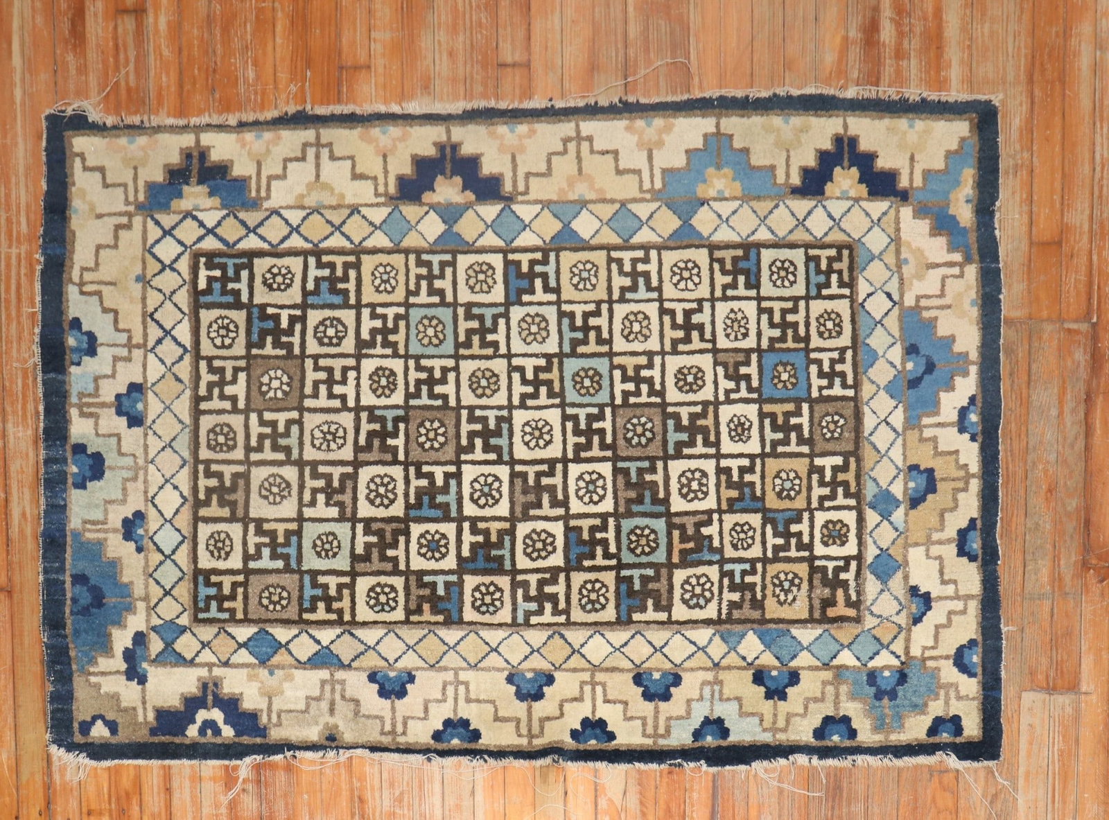 3' 7" x 5' 11" Chinese geometric accent rug: 3' 7" x 5' 11" Chinese geometric accent rug Mid 19th century Chinese geometric accent rug with a rectangular form and an allover pattern featuring geometric elements and floral motifs. Pre-owned. Spec