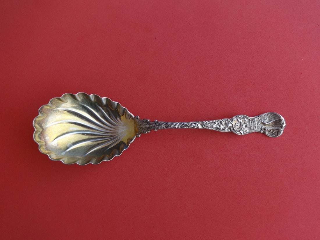 Durgin Heraldic Sterling Silver 9" Berry Spoon Gold Washed Bowl: Durgin Heraldic Sterling Silver 9" Berry Spoon Gold Washed Bowl This exquisite 9" berry spoon from Durgin's Heraldic pattern is crafted from sterling silver, featuring a stunning gold-washed swirl bow