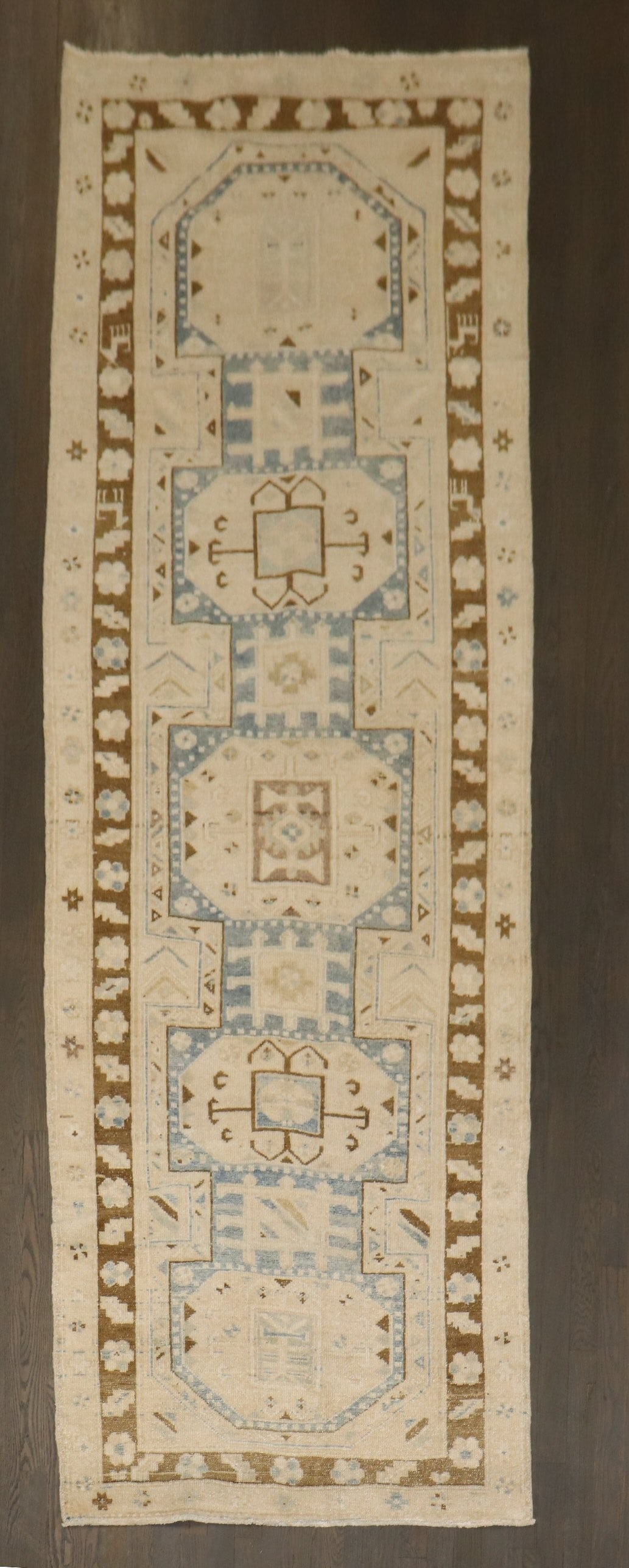 3' 9" x 9' 9" Mid 20th Century Persian Runner Rug: 3' 9" x 9' 9" Mid 20th Century Persian Runner Rug Mid-20th century Persian runner in beige, brown, and blue neutral tones. This pre-owned rug features a wide runner format and classic Persian styling.