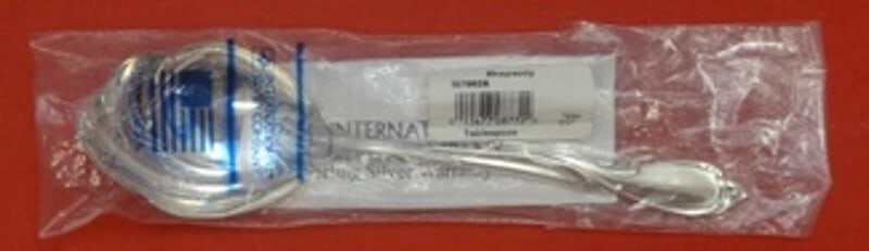 International Sterling Silver Rhapsody New Serving Spoon 8 inch: International Sterling Silver Rhapsody New Serving Spoon 8 inch Enhance your dining experience with the Rhapsody New Serving Spoon from International Sterling. Crafted from high-quality sterling silve