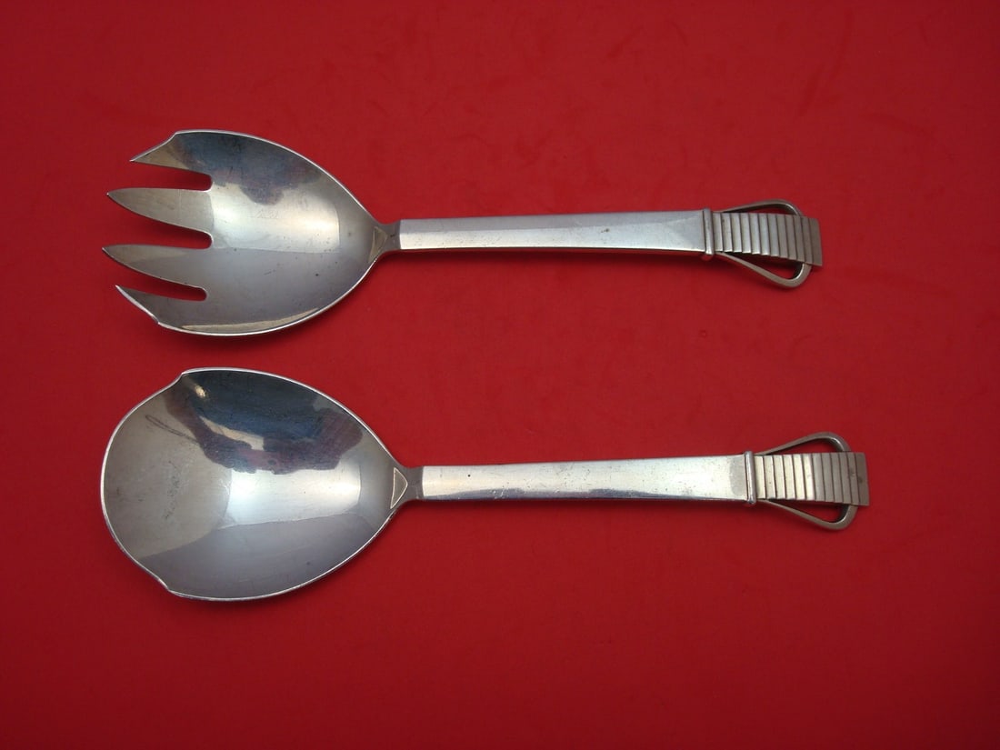 Georg Jensen Parallel Sterling Silver Salad Serving Set 2pc 8in: Georg Jensen Parallel Sterling Silver Salad Serving Set 2pc 8in Elevate your dining experience with this exquisite 2-piece salad serving set from the renowned Parallel collection by Georg Jensen. Craf
