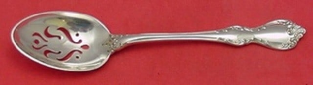 Towle Debussy Sterling Silver Slotted Serving Spoon 8 3/4 inches: Towle Debussy Sterling Silver Slotted Serving Spoon 8 3/4 inches This exquisite serving spoon showcases the elegant Debussy pattern by Towle, crafted from high-quality sterling silver. Featuring a pie