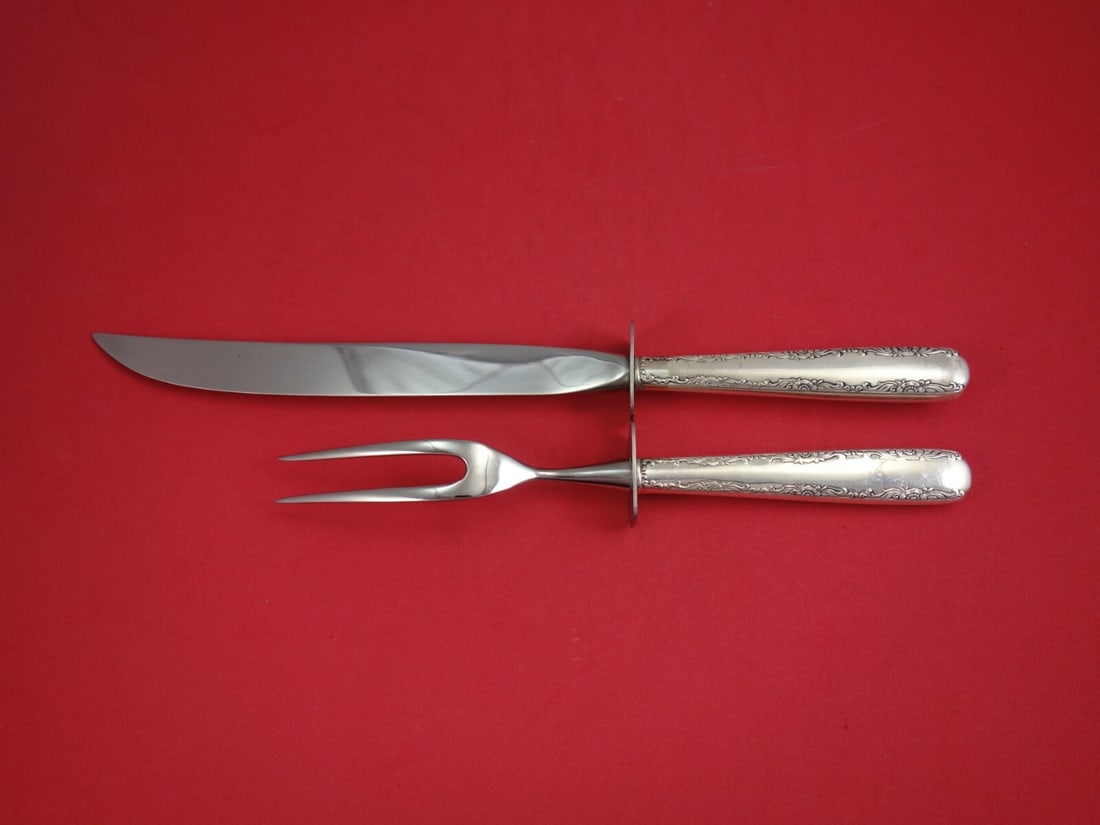 Gorham Camellia Sterling Silver Roast Carving Set 2-Piece: Gorham Camellia Sterling Silver Roast Carving Set 2-Piece Enhance your dining experience with this exquisite 2-piece roast carving set from Gorham, featuring the elegant Camellia pattern. Crafted from