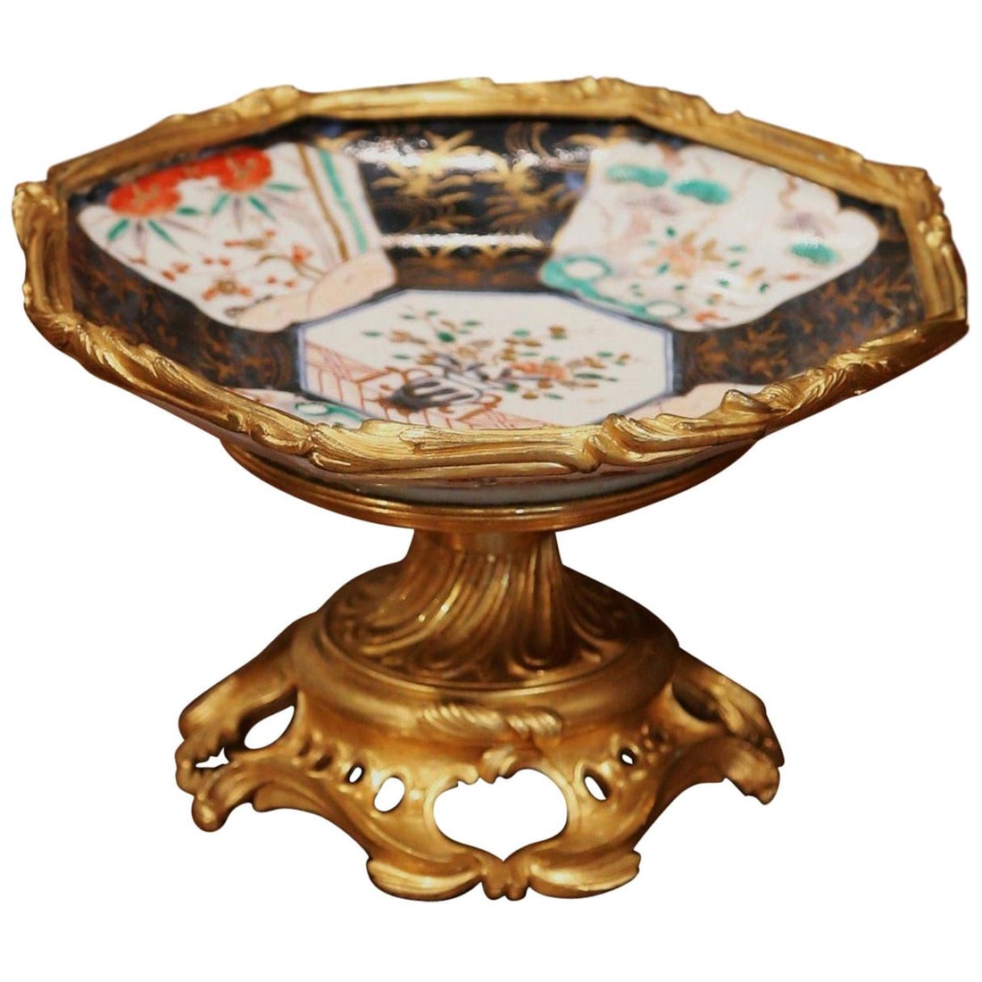 19th Century Japanese Imari Bowl on Louis XV Gilt Bronze Base: 19th Century Japanese Imari Bowl on Louis XV Gilt Bronze Base Elevate your interior decor with this exquisite 19th Century Japanese Imari Porcelain Bowl elegantly mounted on a French Louis XV ormolu b