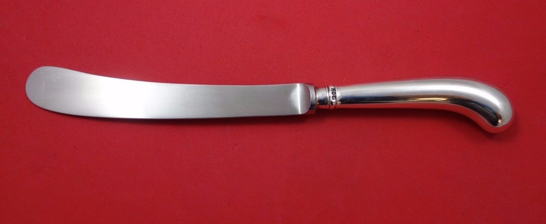 James Robinson Scroll Sterling Silver Dinner Knife Pistol Grip 9.5": James Robinson Scroll Sterling Silver Dinner Knife Pistol Grip 9.5" Enhance your dining experience with this exquisite Sterling Silver Dinner Knife from the Scroll pattern by James Robinson. Crafted i