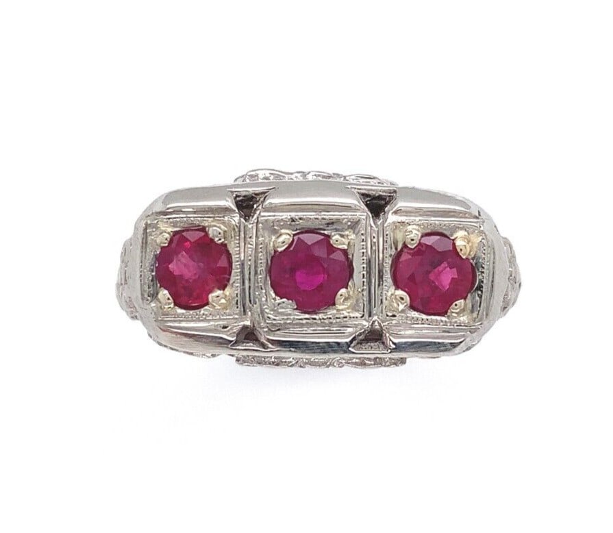Art Deco 14k White Gold Three Stone Ruby Ring .80ct GIA Certified: Art Deco 14k White Gold Three Stone Ruby Ring .80ct GIA Certified This exquisite Art Deco filigree ring is crafted from 14k white gold and features three genuine natural rubies. The total carat weight