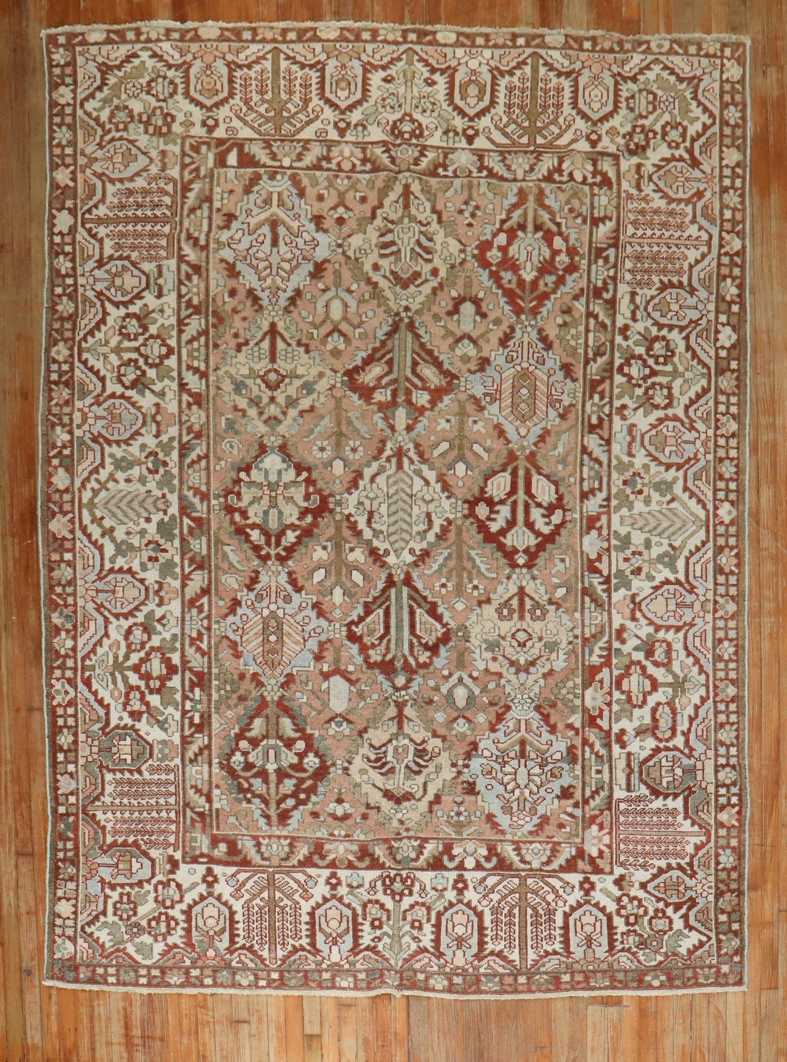 7' 5" x 10' 4" Mid 20th Century Persian Bakhtiari Room Rug: 7' 5" x 10' 4" Mid 20th Century Persian Bakhtiari Room Rug Mid-20th century Persian Bakhtiari room rug in a brown colorway. This pre-owned rug is a small room size example of the Bakhtiari type. Speci