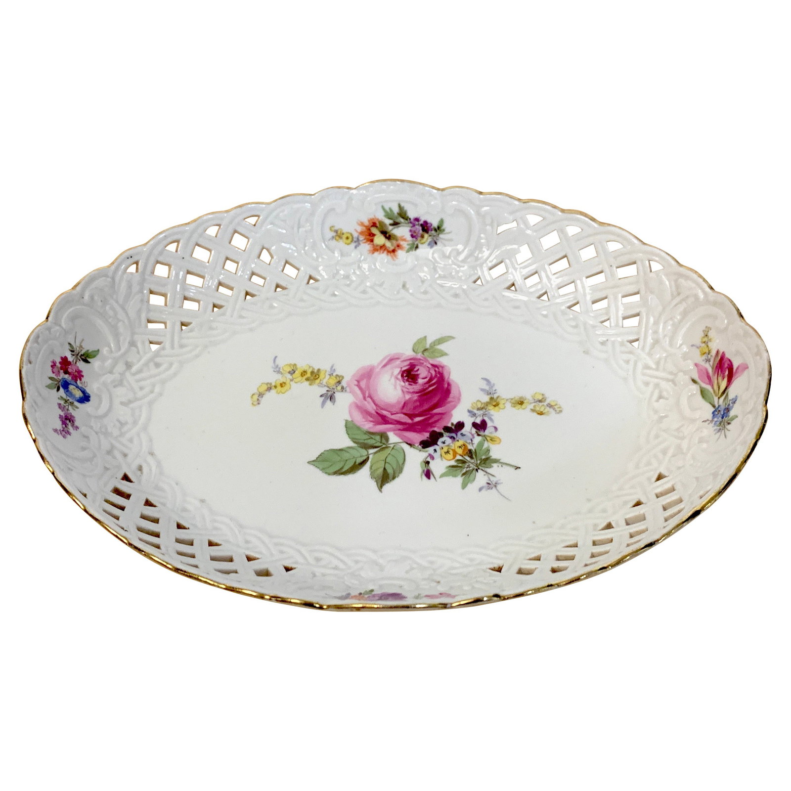 19th Century Meissen Floral Painted Oval Basket with Gilt Rim: 19th Century Meissen Floral Painted Oval Basket with Gilt Rim This exquisite 19th century Meissen floral painted reticulated oval basket showcases the artistry of German porcelain craftsmanship. Manuf
